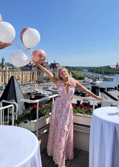 Pink Floral Ruffle Maxi Dress with Cut-Out Waist and Ring Detail